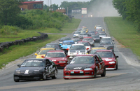 32 cars take the green.